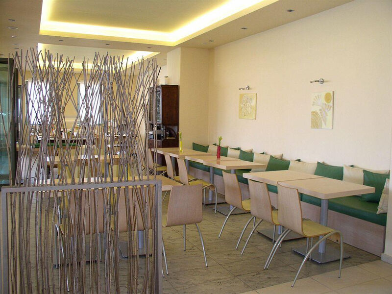 Astra Village Hotel & Suites