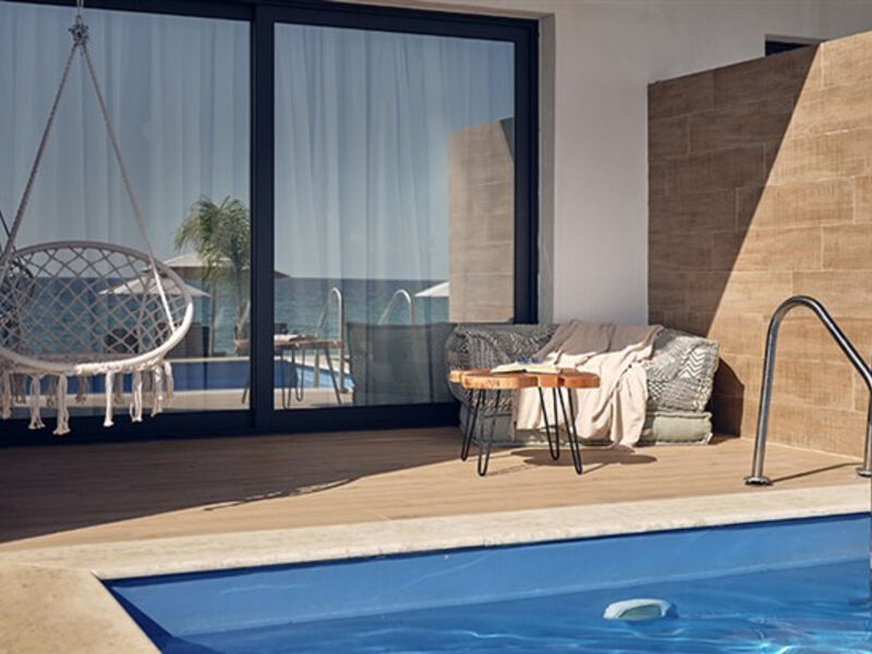 Cavo Orient Beach & Suites
